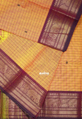 Light Orange - Karthigai Silk Cotton Checks with Buttas Yanai, Mayil Border - Best for Festive Wear | Temple Visit