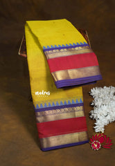 Yellow - Karthigai silk cotton in body with mango and temple skirt border with buttas - Best for Temple Visit