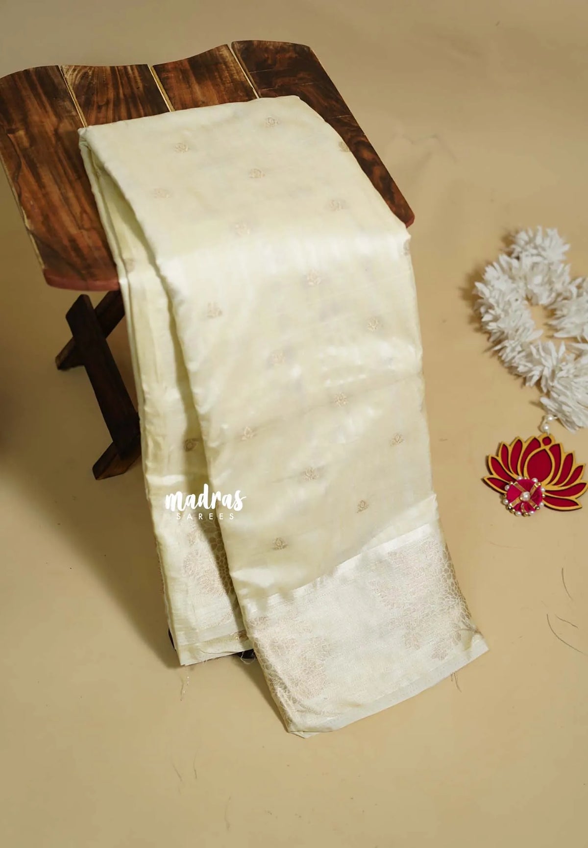 Ivory Cream - Madhuram - Soft Matka silk with grooves body and floral border with buttas