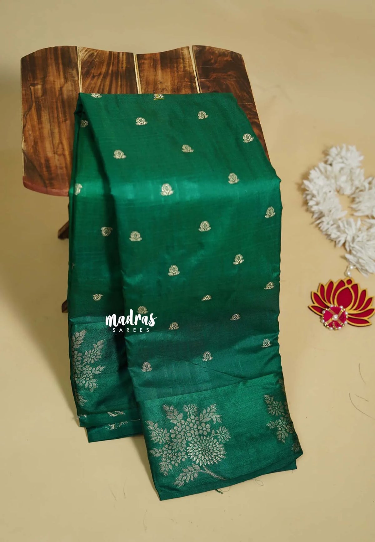 Dark Green - Madhuram - Soft Matka silk with grooves body and floral border with buttas