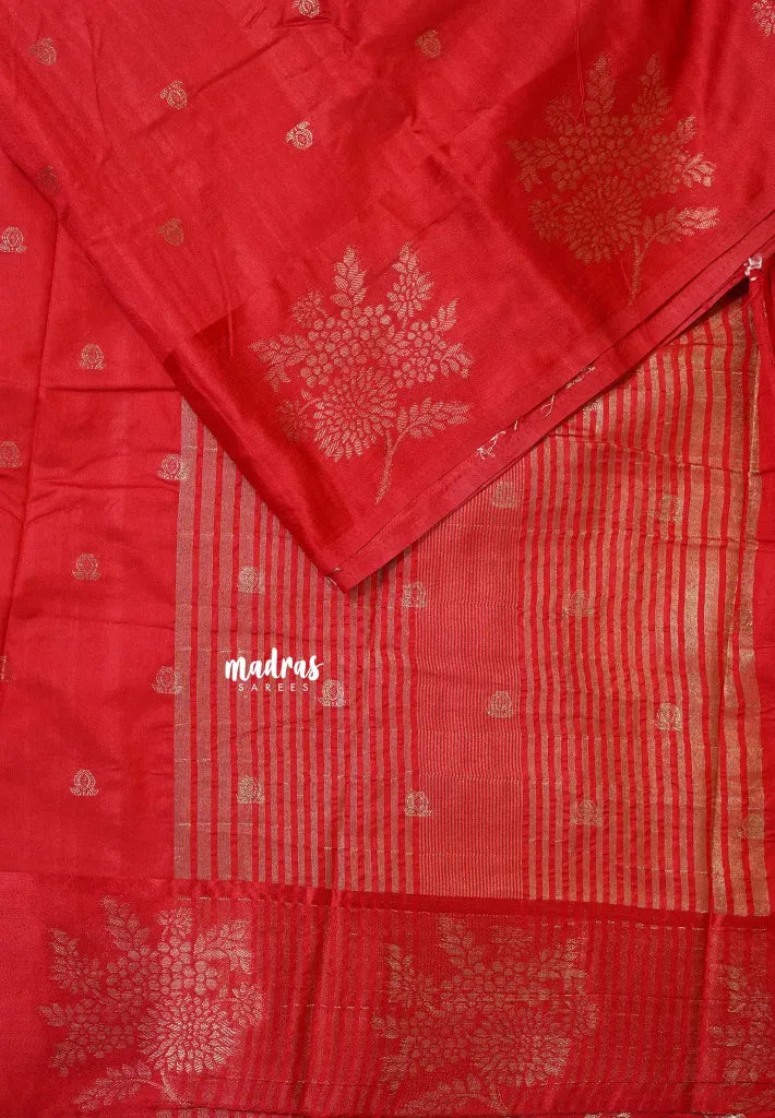 Classic Red - Madhuram - Soft Matka silk with grooves body and floral border with buttas