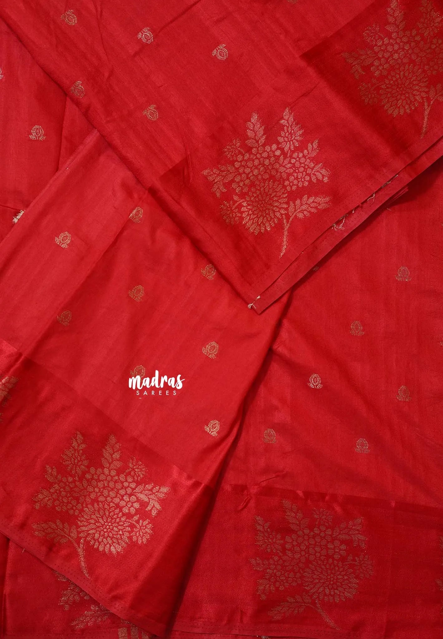Classic Red - Madhuram - Soft Matka silk with grooves body and floral border with buttas
