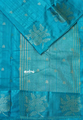 Blue - Madhuram - Soft Matka silk with grooves body and floral border with buttas