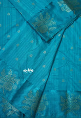 Blue - Madhuram - Soft Matka silk with grooves body and floral border with buttas