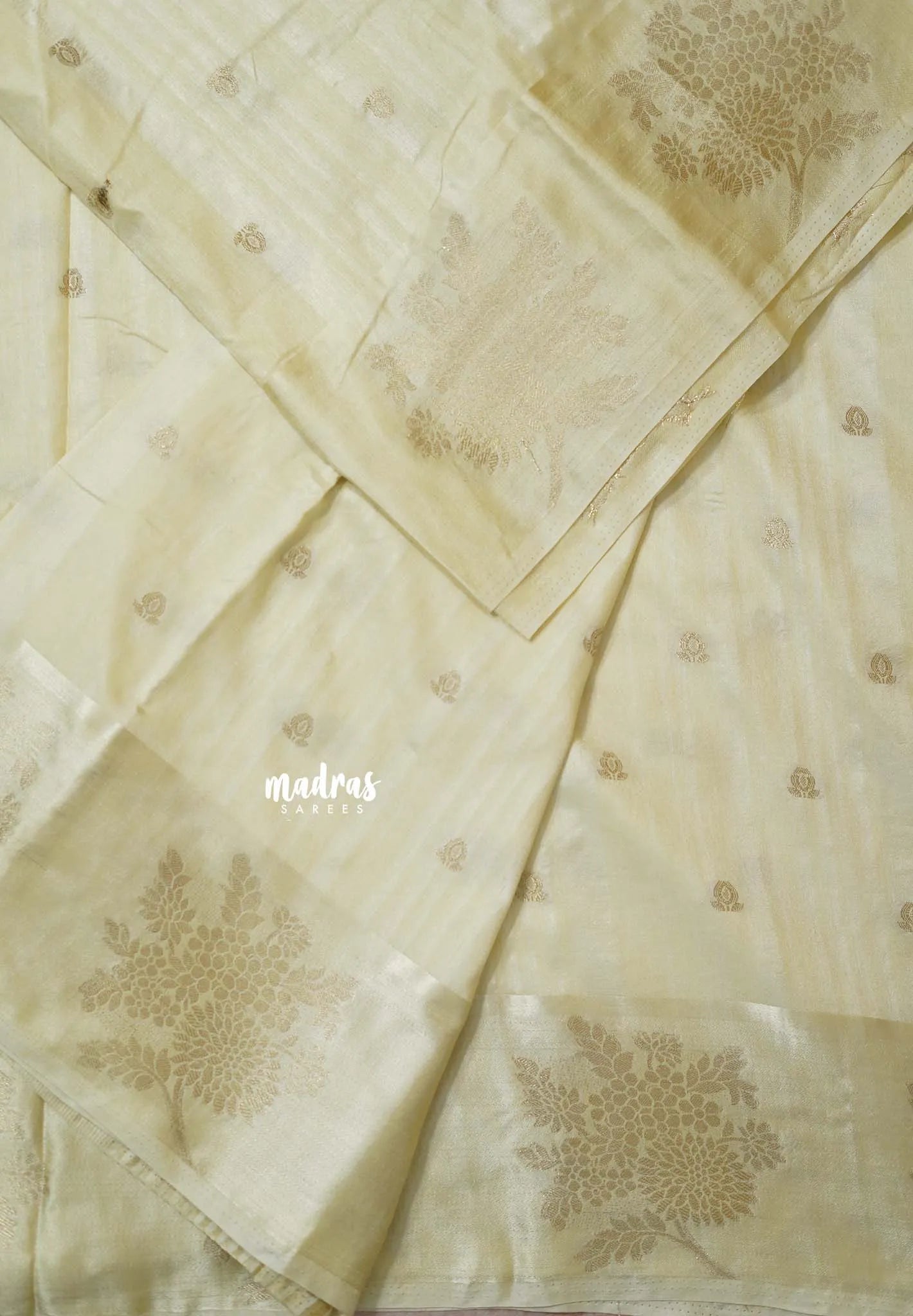 Ivory Cream - Madhuram - Soft Matka silk with grooves body and floral border with buttas