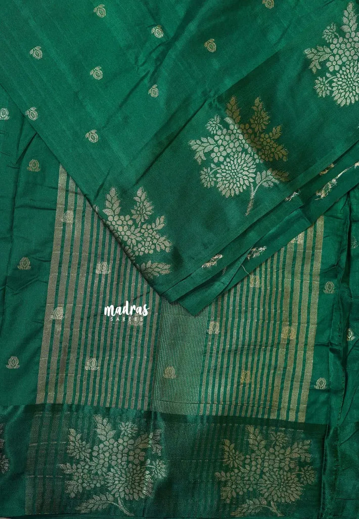 Dark Green - Madhuram - Soft Matka silk with grooves body and floral border with buttas
