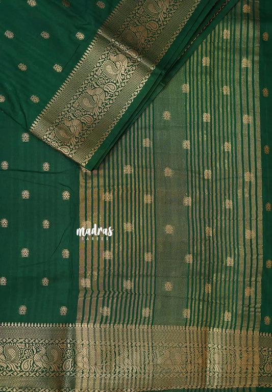 Dark Green - Madhuram - Soft Matka silk with grooves body and temple peacock border
