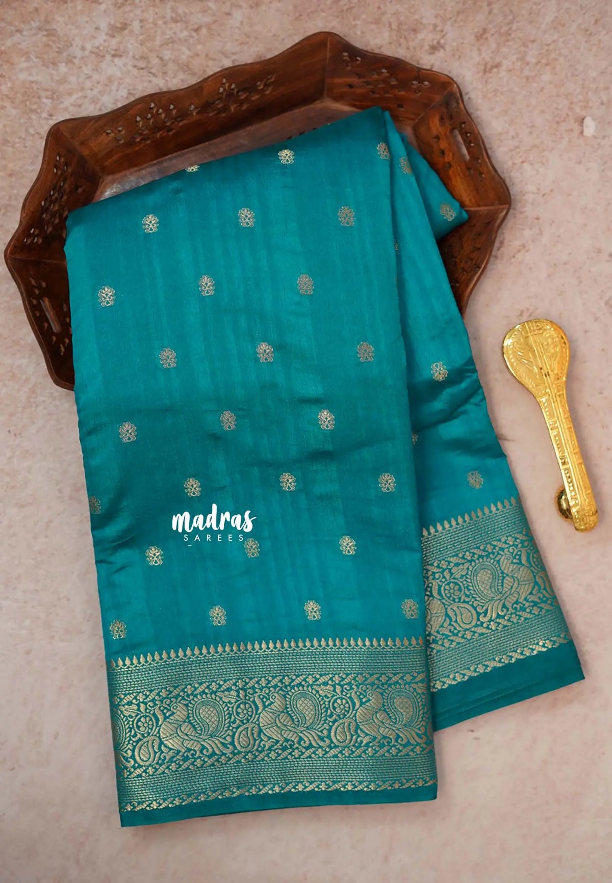Teal Blue - Madhuram - Soft Matka silk with grooves body and temple peacock border