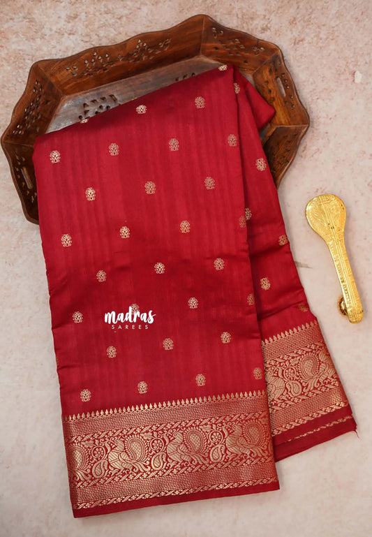 Majestic Maroon - Madhuram - Soft Matka silk with grooves body and temple peacock border