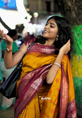 Turmeric Orange - Thendral - Kanchi semi silk buttas body rettapetta border