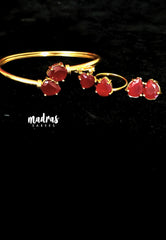 Premium 1 Gram Gold Polish Combo Set of Bracelet, Ring, Pendant and Earings with Dark Maroon Stone for Women