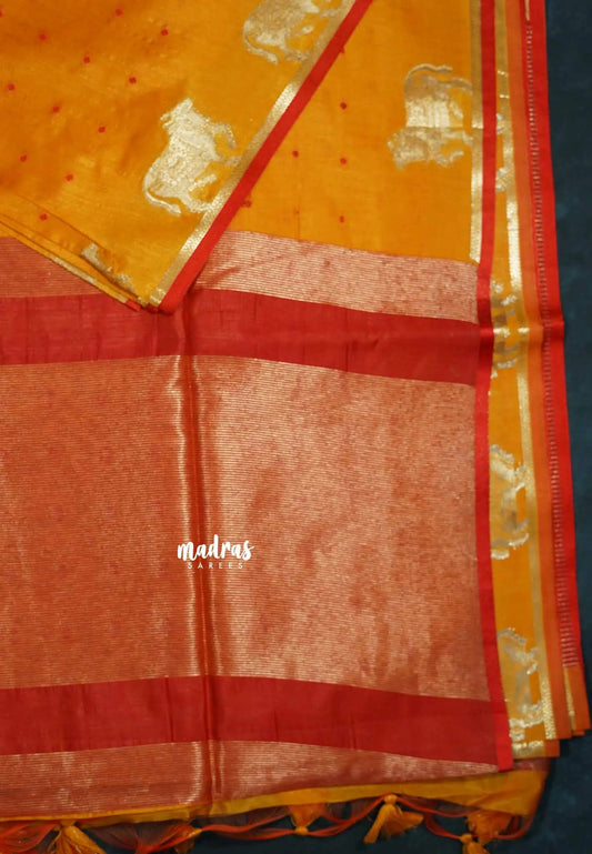 Mild orange - Manjari - Premium raw silk with full weaving buttas pichwai cow border