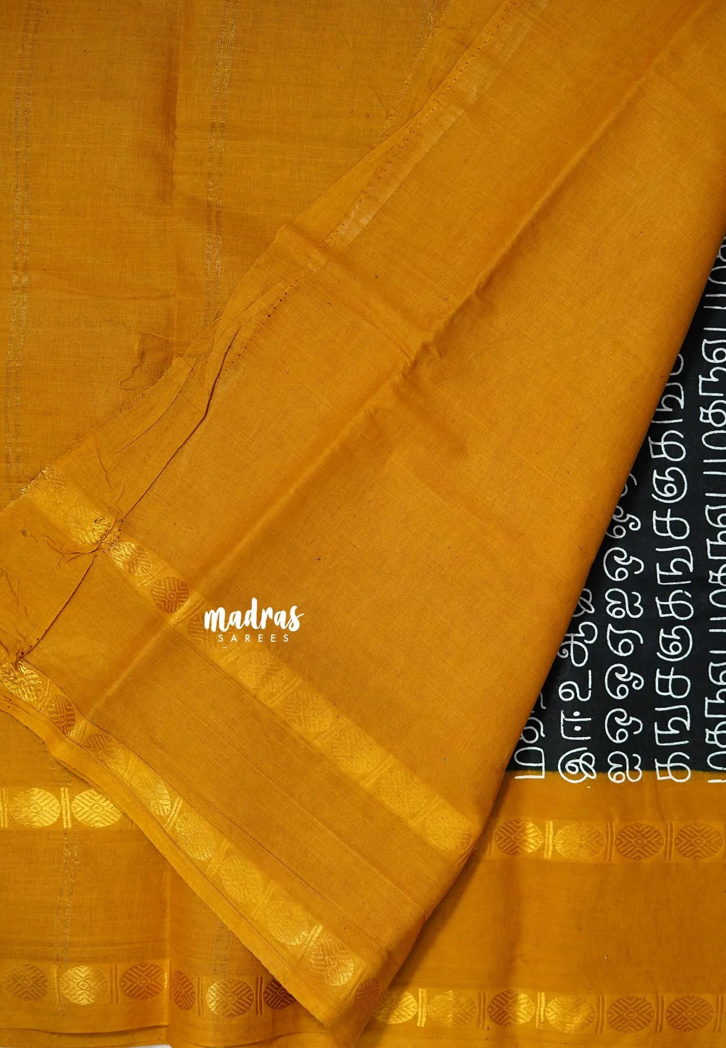 Mozhi - Sungudi cotton with tamil letters rettapet rudraksham border - Black with Mustard Yellow