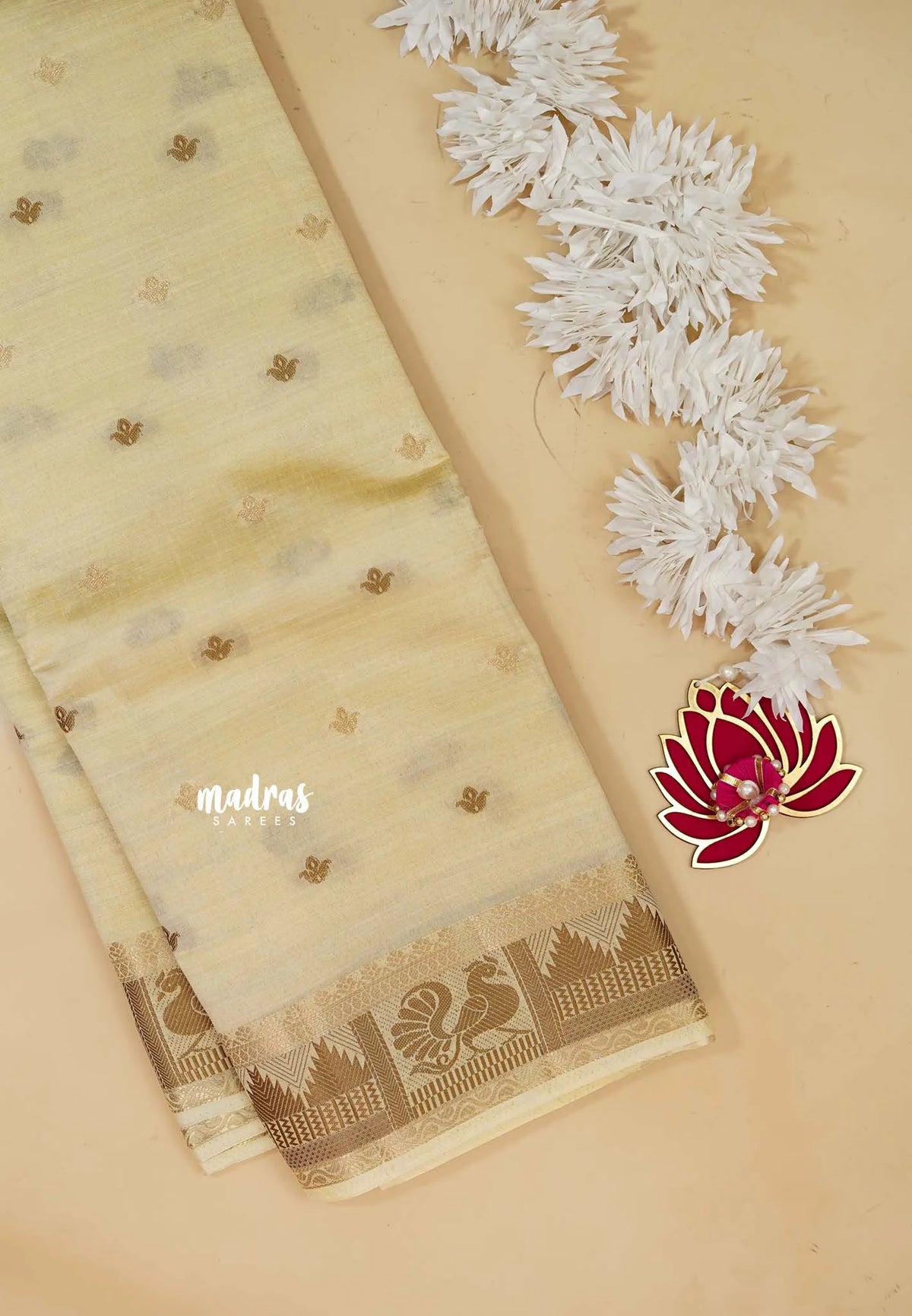Beige - Raaga - Semi Tussar Plain body with Buttas and Mayil Border