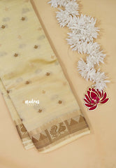 Beige - Raaga - Semi Tussar Plain body with Buttas and Mayil Border
