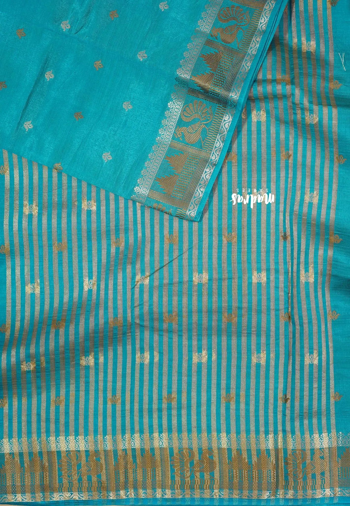Teal Blue - Raaga - Semi Tussar Plain body with Buttas and Mayil Border