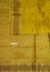 Paris Yellow - Raaga - Semi Tussar Plain body with Buttas and Mayil Border