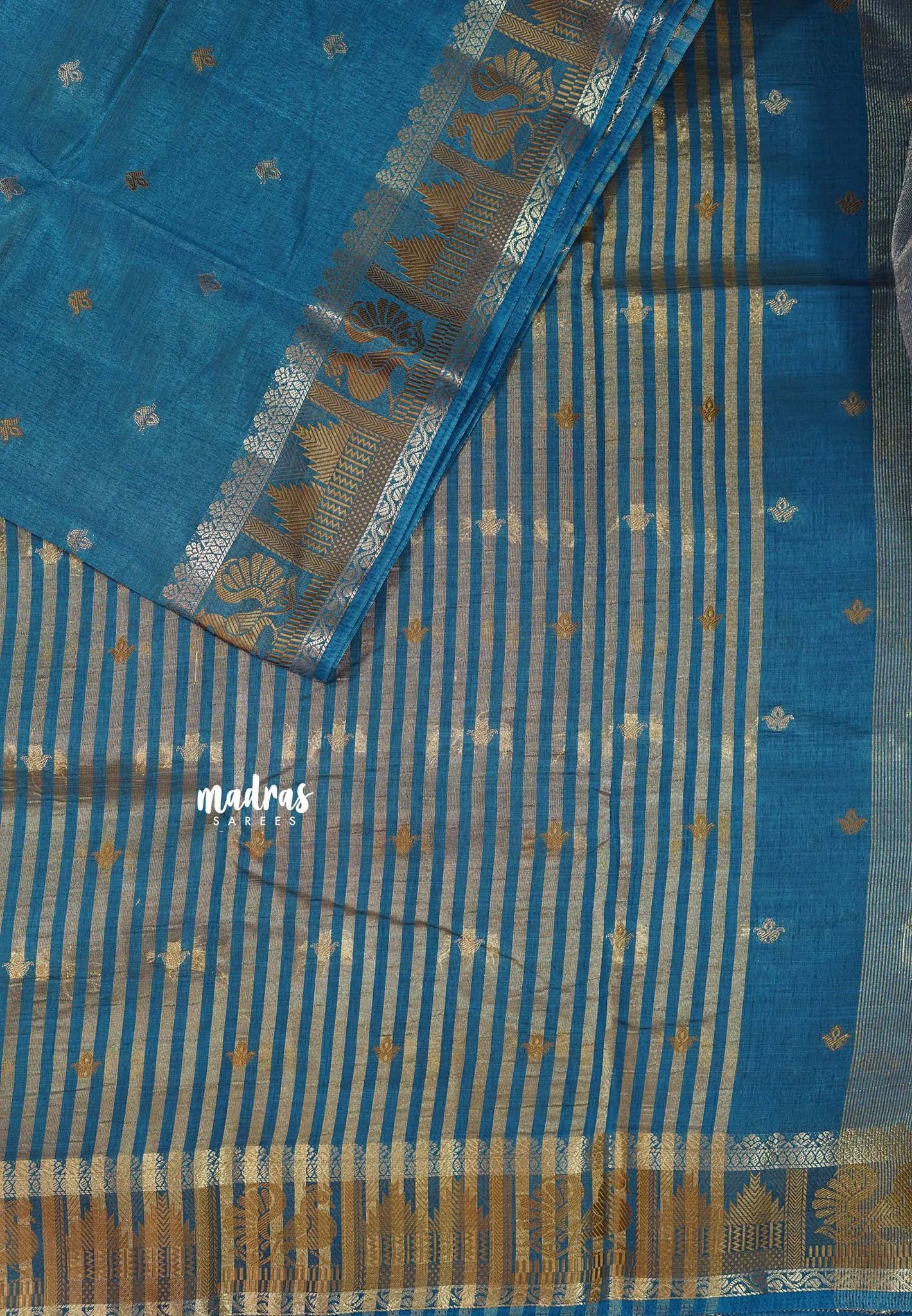Peacock Blue - Raaga - Semi Tussar Plain body with Buttas and Mayil Border