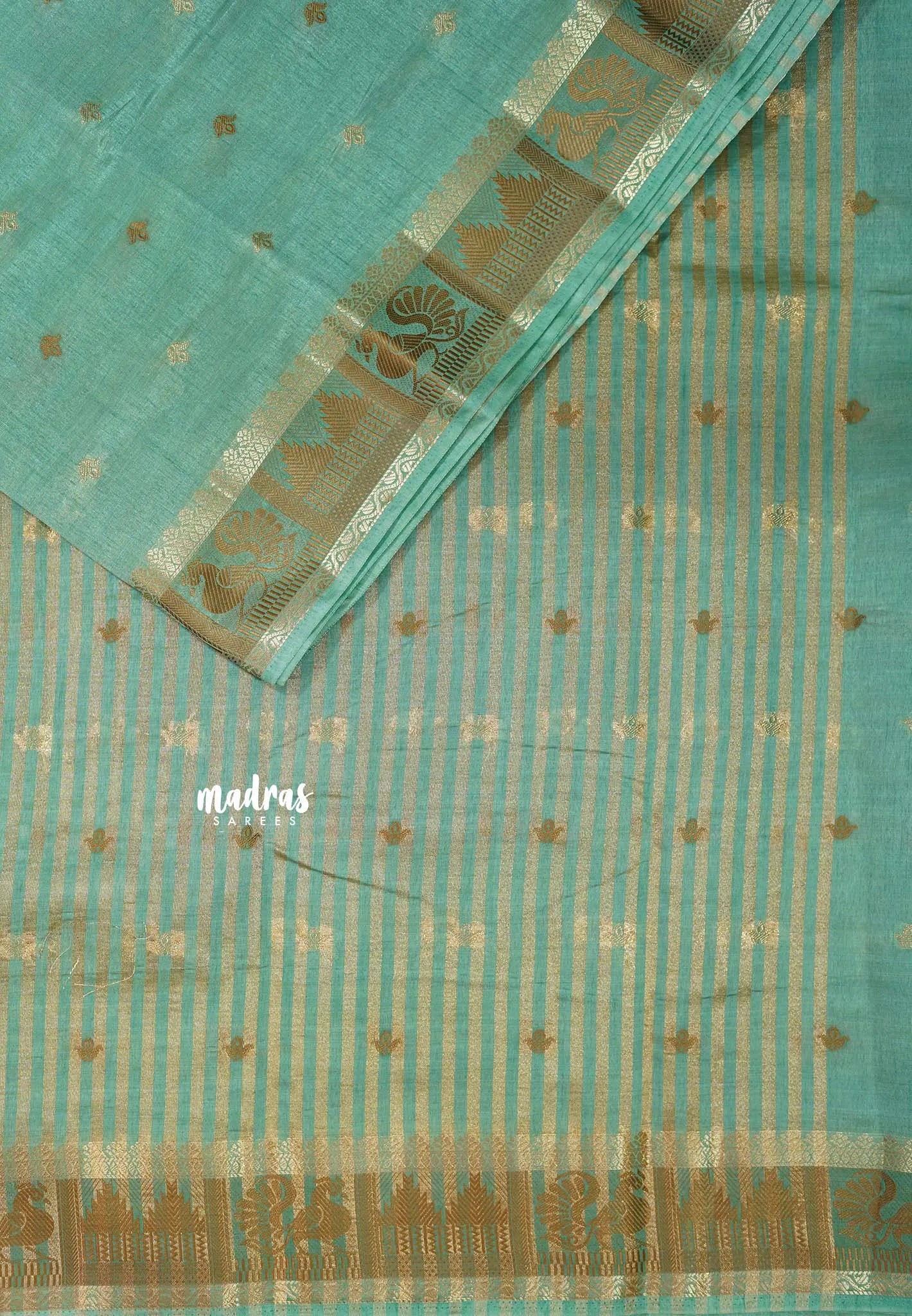 Muted Sea Green - Raaga - Semi Tussar Plain body with Buttas and Mayil Border