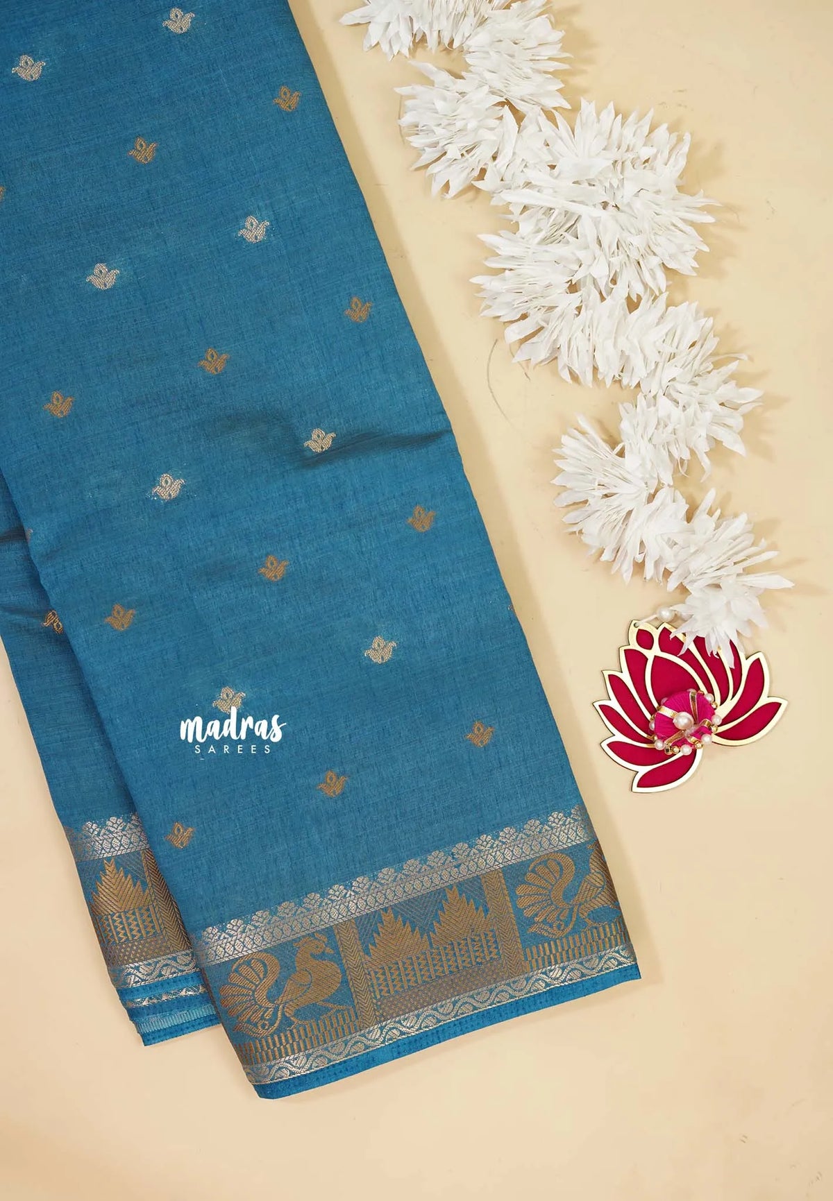 Peacock Blue - Raaga - Semi Tussar Plain body with Buttas and Mayil Border