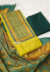 Amitha – Yellowish Green Semi silk salwar suit with tissue yoke and dupatta cotton bottom