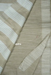 Jute beige - Sithara - Semi Tussar saree with full Green embroidery