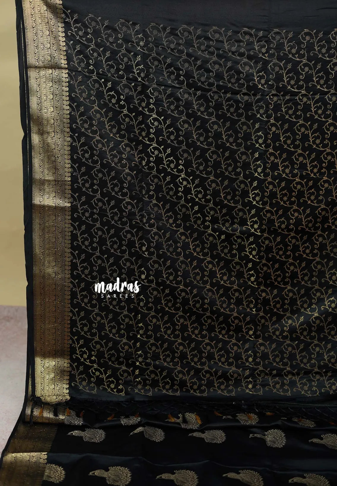 Black Pearl - Sri valli pure satin silk with peacock buttas and gold zari border