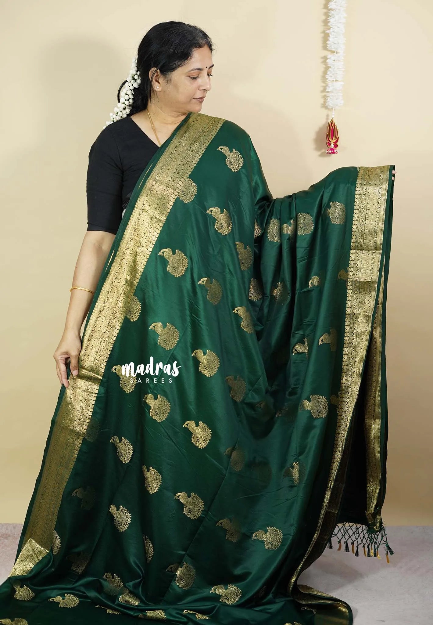 Dark Green - Sri valli pure satin silk with peacock buttas and gold zari border