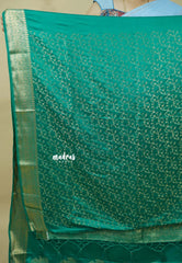 Emerald Green - Sri valli pure satin silk with peacock buttas and gold zari border