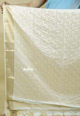 Ivory white - Sri valli pure satin silk with peacock buttas and gold zari border