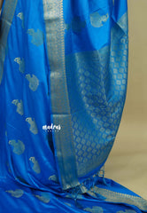 Bright blue - Sri valli pure satin silk with peacock buttas and gold zari border