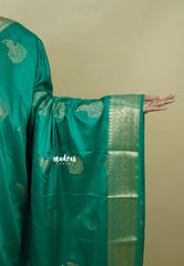 Emerald Green - Sri valli pure satin silk with peacock buttas and gold zari border