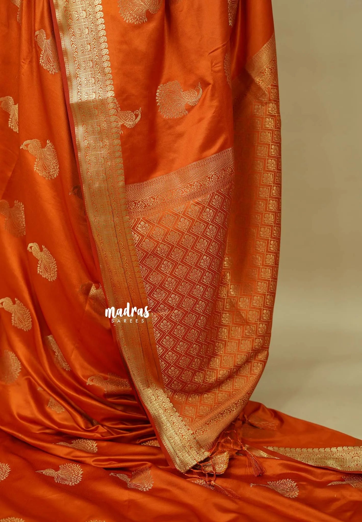 Burnt Orange - Sri valli pure satin silk with peacock buttas and gold zari border