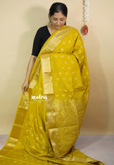 Greenish Yellow - Vadhanam - Premium Jute Tussar silk with buttas and gold zari border