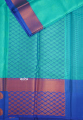 Ahaana - semi silk with emboss weaving - Turquoise Blue saree