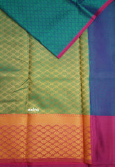 Ahaana - semi silk with emboss weaving Teal blue