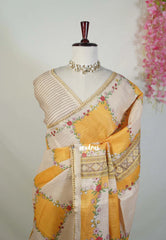Sand Beige with Orangish Yellow - Anjali - Soft Tissue Linen Saree with Floral Print & Lace Border – Best for Pooja Functions