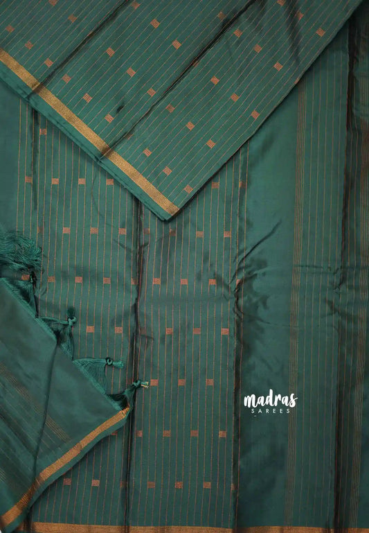 Arani semi soft silk saree with weaving buttas small border - bottle green