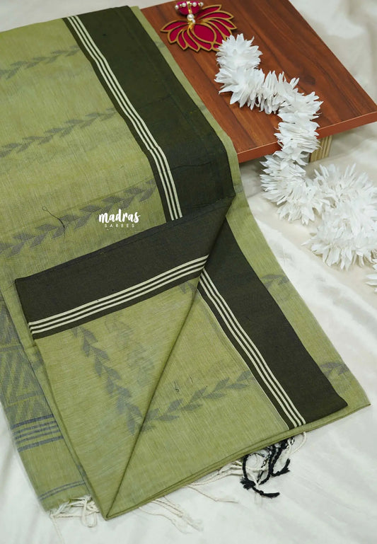 Pista green - Premium Assam khadi cotton with handwoven buttas and pallu