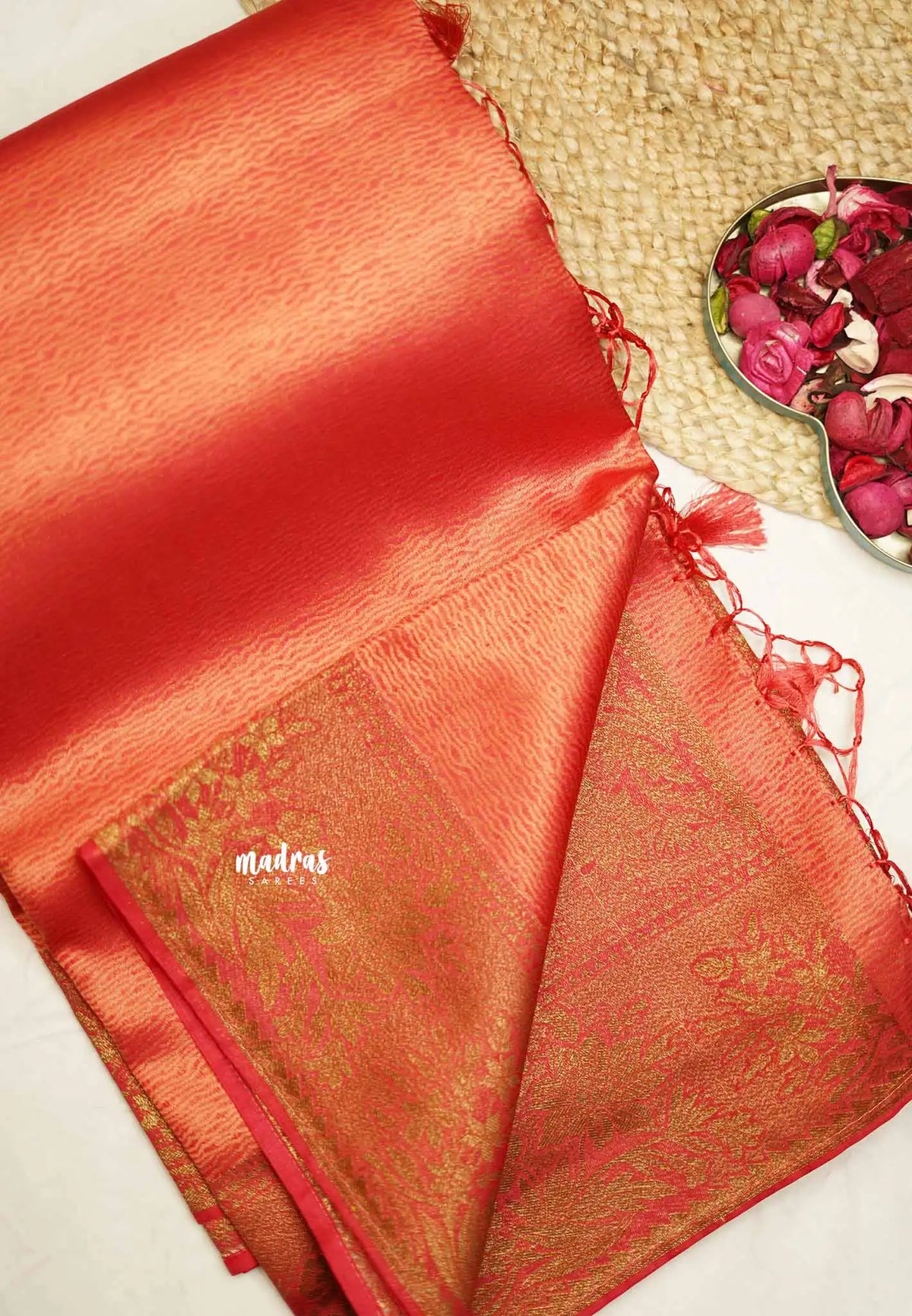 Bavanchi - Fusion of Banaras and Kanchi  Wavy body design with floral weaving border - Reddish Pink