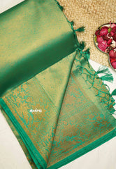 Bavanchi - Fusion of Banaras and Kanchi  Wavy body design with floral weaving border - Teal green