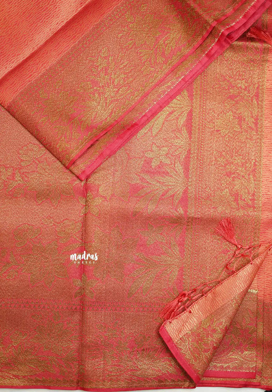 Bavanchi - Fusion of Banaras and Kanchi  Wavy body design with floral weaving border - Reddish Pink