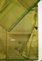 Bavanchi - Fusion of Banaras and Kanchi  Wavy body design with floral weaving border - Pasi Green