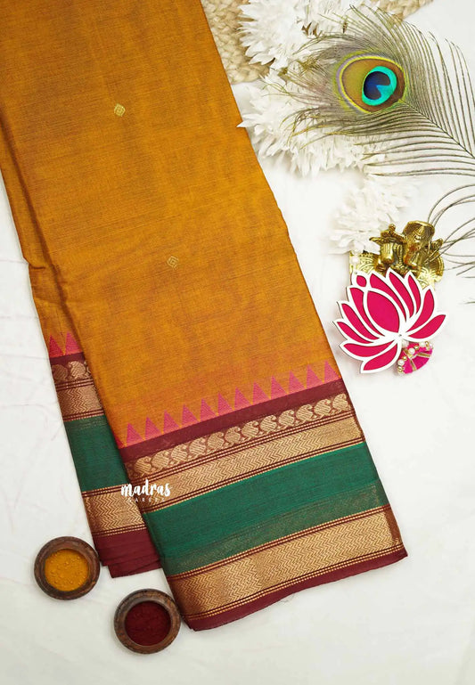 Karthigai silk cotton multi border with temple weaving - dual shade sunset orange