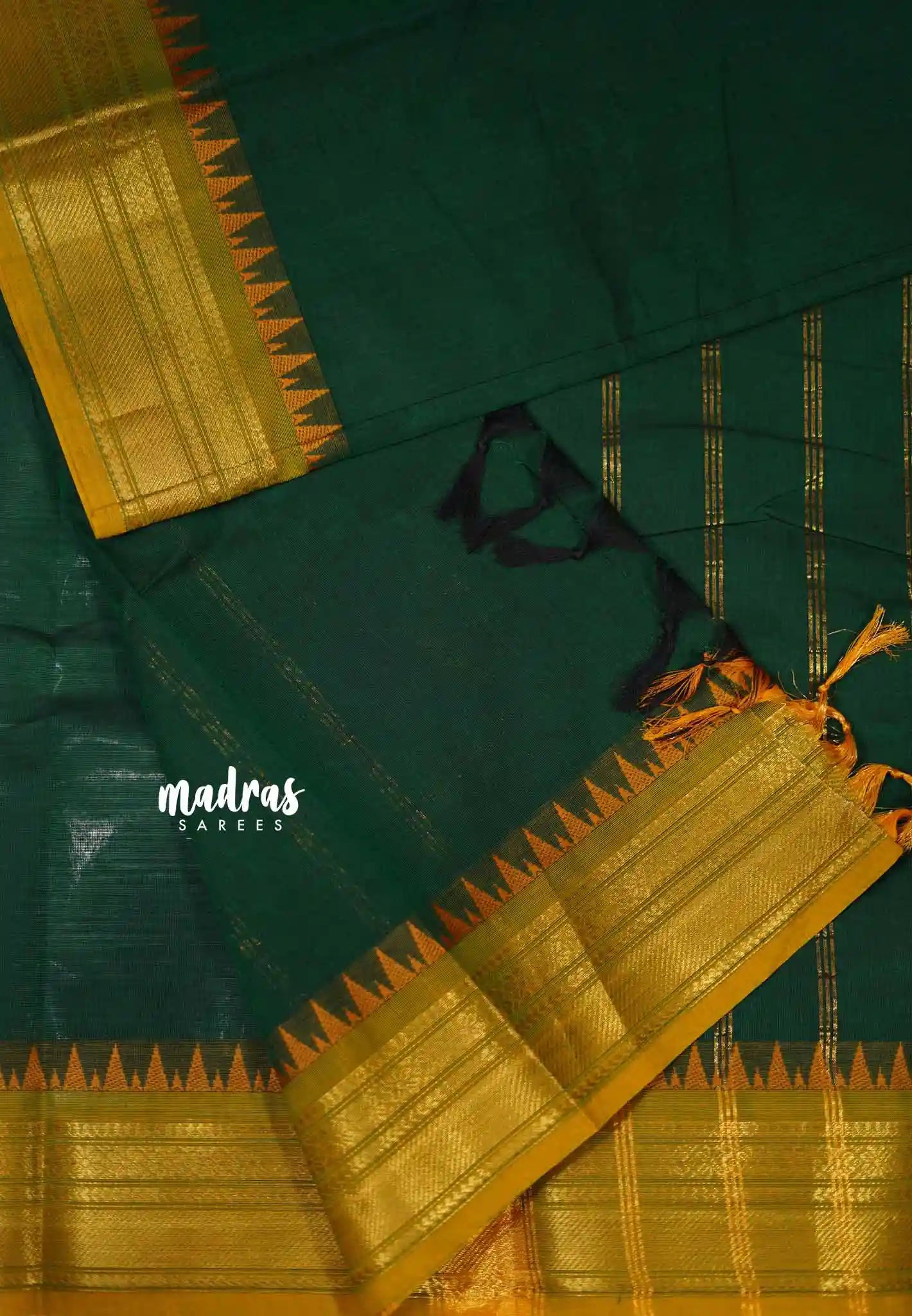 Karthigai silk cotton Plain with temple Bavanji border Dark green