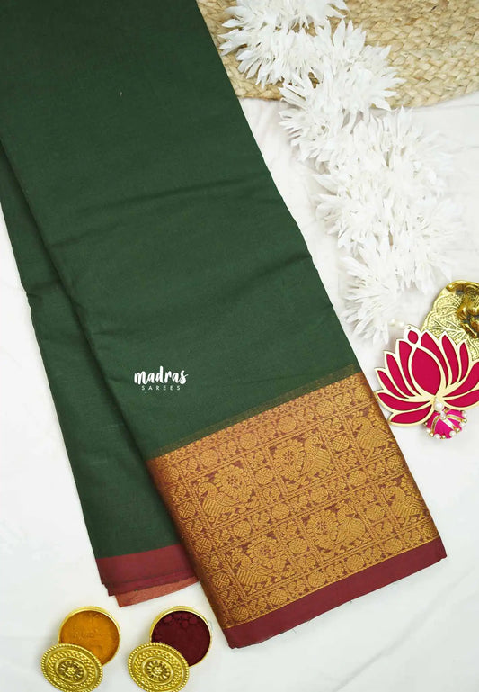 Karthigai silk cotton plain body big mayil border - Green