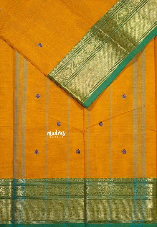 Orangish Yellow - Karthigai silk cotton Bavanji Border with Buttas in saree