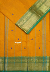 Orangish Yellow - Karthigai silk cotton Bavanji Border with Buttas in saree