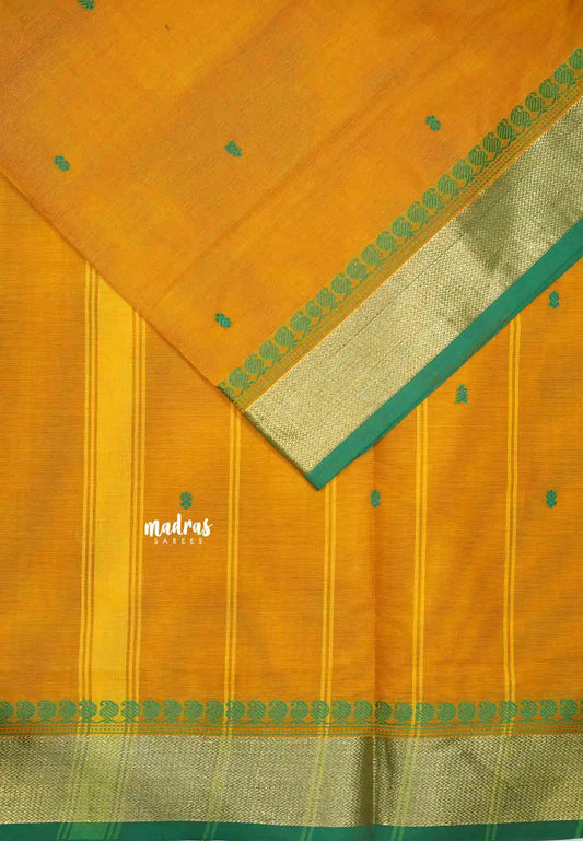 Karthigai silk cotton mango bavanji border - yellowish orange