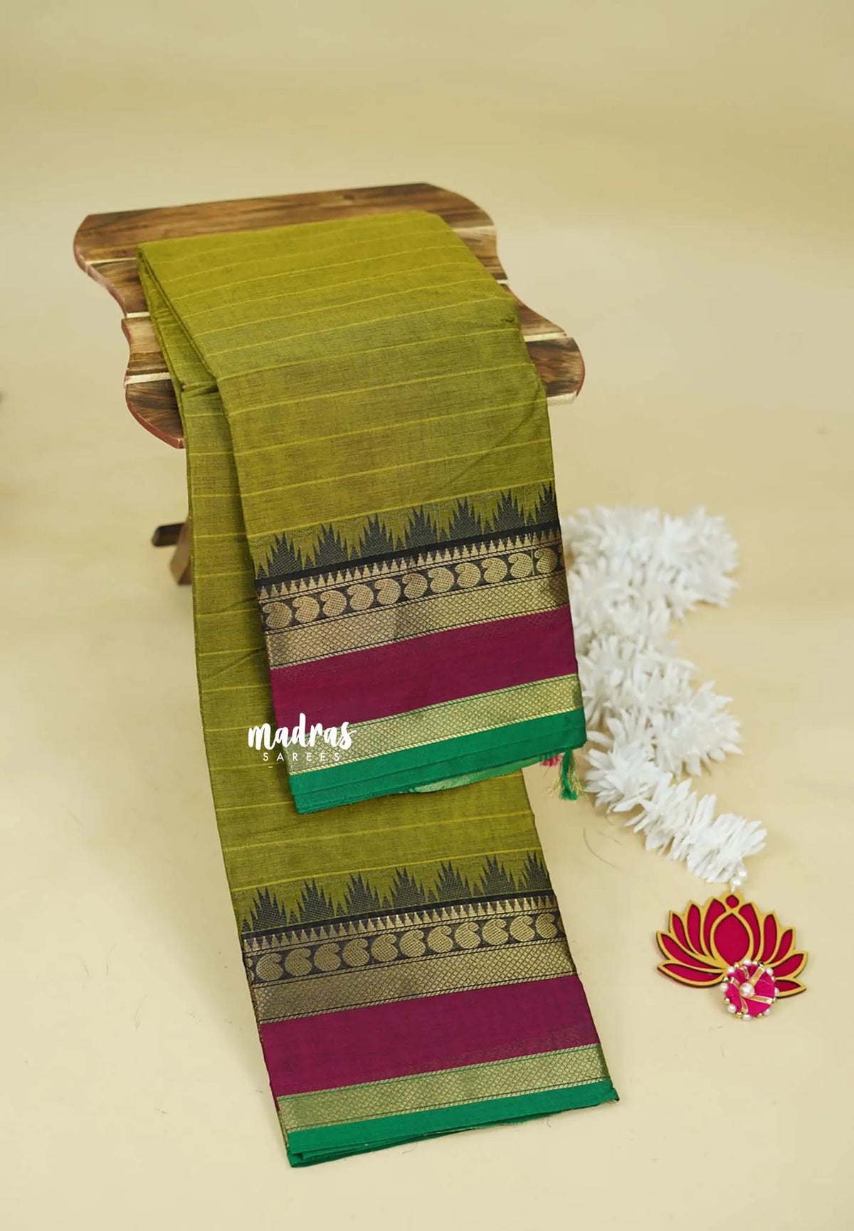Olive Green- Karthigai silk cotton stripes in body with mango and temple skirt border